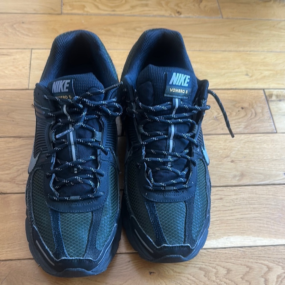 Nike Black Athletic Shoes with Mesh Upper and Supportive Midsole